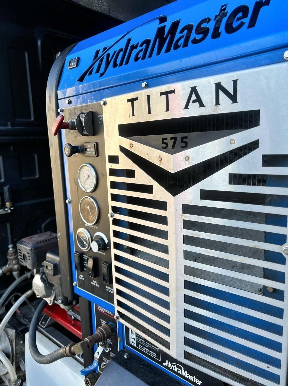 Truck-mounted HydraMaster unit ready for an overnight commercial clean